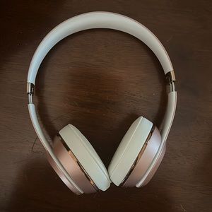 Beats by dre headphones (comes with case and charger)